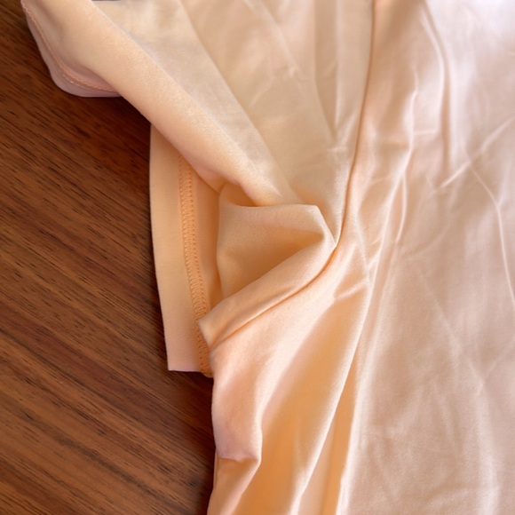 Bright peach short sleeve SKIMS top - Picture 6 of 8